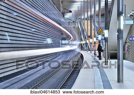 Stock Image - City-Tunnel Leipzig, stop Market, approaching S-Bahn, long time exposure, light tracks, Leipzig, Saxony, Germany, Europe. Fotosearch