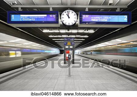 Stock Photograph - City-Tunnel Leipzig, stopping point Bayerischer Bahnhof, moving S-Bahn, suburban train, scoreboards, long-term exposure, light tracks, Leipzig, Saxony, Germany, Europe. Fotosearch