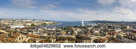 Cityscape with Lake Geneva Lake and the fountain Jet d'eau taken from a tower of the Cathedrale Saint Pierre, Geneva, Switzerland, Europe View Large Photo Image Stock Image - Cityscape with Lake Geneva Lake and the fountain Jet d'eau taken from a tower of the Cathedrale Saint Pierre, Geneva, Switzerland, Europe. Fotosearch