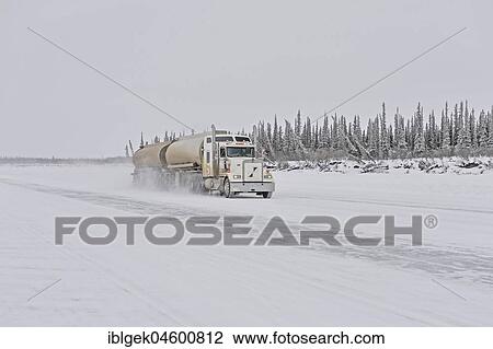 Cleared ice road with truck, Ice Road, on the Mackenzie River, Inuvik, Northwest Territories, Canada, North America View Large Photo Image Stock Image - Cleared ice road with truck, Ice Road, on the Mackenzie River, Inuvik, Northwest Territories, Canada, North America. Fotosearch