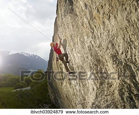 Climber lead climbing on a rock face, Martinswand, Zirl, Tyrol, Austria, Europe View Large Photo Image Stock Photo - Climber lead climbing on a rock face, Martinswand, Zirl, Tyrol, Austria, Europe. Fotosearch