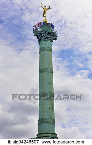 Stock Photo - Colonne de Juillet or July Column with National Flag, memorial column for the victims of the July Revolution in 1830, Paris, Ile de France, France, Europe. Fotosearch