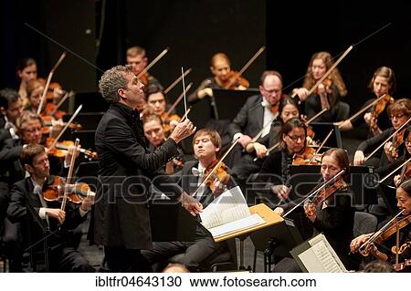 Conductor Dirk Kaftan with Beethoven Orchestra Bonn, Musik-Institut Koblenz, Koblenz, Rhineland-Palatinate, Germany, Europe View Large Photo Image Stock Image - Conductor Dirk Kaftan with Beethoven Orchestra Bonn, Musik-Institut Koblenz, Koblenz, Rhineland-Palatinate, Germany, Europe. Fotosearch