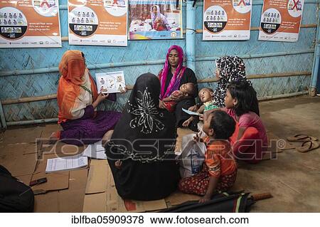 Consultation hours for Rohingya woman on breastfeeding and infant nutrition, Kutupalong Camp, Cox Bazaar, Bangladesh, Asia View Large Photo Image Stock Photo - Consultation hours for Rohingya woman on breastfeeding and infant nutrition, Kutupalong Camp, Cox Bazaar, Bangladesh, Asia. Fotosearch