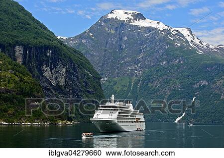 Cruise ship Silver Whisper and shuttle boat in Geiranger, Geiranger, Norway, Europe View Large Photo Image Stock Image - Cruise ship Silver Whisper and shuttle boat in Geiranger, Geiranger, Norway, Europe. Fotosearch