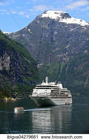 Cruise ship Silver Whisper and shuttle boat in Geiranger, Geiranger, Norway, Europe View Large Photo Image Stock Image - Cruise ship Silver Whisper and shuttle boat in Geiranger, Geiranger, Norway, Europe. Fotosearch