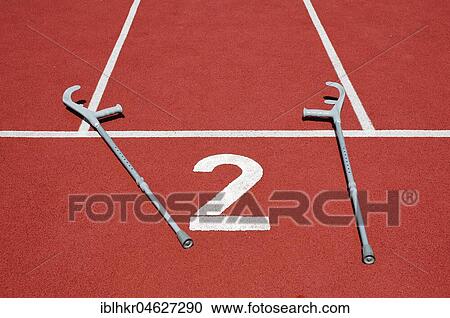 Crutches on the sports field, Berlin, Germany, Europe View Large Photo Image Stock Image - Crutches on the sports field, Berlin, Germany, Europe. Fotosearch