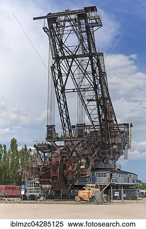 Decommissioned bucket wheel excavator, open pit coal mine, Ostritz, Upper Lusatia, Saxony, Germany, Europe View Large Photo Image Stock Photography - Decommissioned bucket wheel excavator, open pit coal mine, Ostritz, Upper Lusatia, Saxony, Germany, Europe. Fotosearch