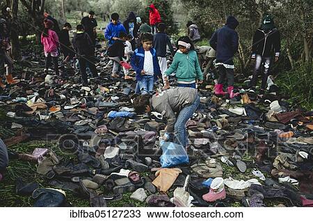 Delivery of old shoes for the inmates of Camp Moria, Lesbos, Greece, Europe View Large Photo Image Stock Image - Delivery of old shoes for the inmates of Camp Moria, Lesbos, Greece, Europe. Fotosearch