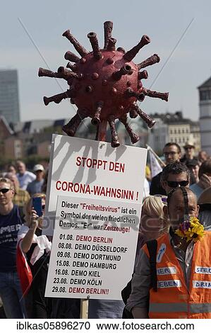 Demo against corona rules on Rhine meadows, stops corona madness, three-dimensional corona virus model, Düsseldorf, North Rhine-Westphalia, Germany, Europe View Large Photo Image Stock Image - Demo against corona rules on Rhine meadows, stops corona madness, three-dimensional corona virus model, Düsseldorf, North Rhine-Westphalia, Germany, Europe. Fotosearch