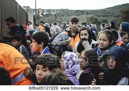 Stock Photo - Distribution of milk powder and nappies for the refugees in Camp Moria, Lesbos, Greece, Europe. Fotosearch