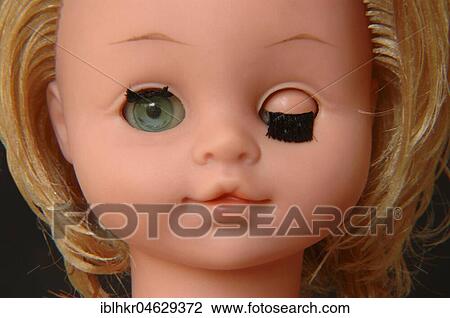 Doll winking with eyes, flea market, Berlin, Germany, Europe View Large Photo Image Stock Image - Doll winking with eyes, flea market, Berlin, Germany, Europe. Fotosearch