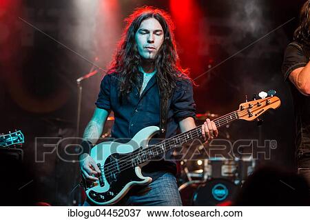 Stock Photo - Dominik Pfister, bassist of the Swiss hard rock band Shakra live in Lucerne, Switzerland, Europe. Fotosearch