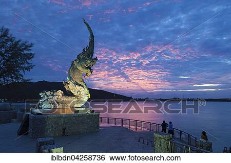 Dragon fountain at dusk on the promenade in Songkhla, Thailand, Asia View Large Photo Image Stock Photograph - Dragon fountain at dusk on the promenade in Songkhla, Thailand, Asia. Fotosearch