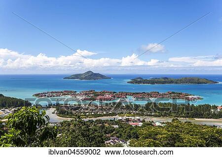 East cost with Resort Eden Island, Ile au Cerf, Ste Anne Marine National Park, Mahe Island, Seychelles, Africa View Large Photo Image Stock Image - East cost with Resort Eden Island, Ile au Cerf, Ste Anne Marine National Park, Mahe Island, Seychelles, Africa. Fotosearch