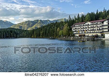 Eibsee Lake, Eibsee-Hotel, Grainau, Werdenfelser Land, Ammergau Alps, Scharfeck, Friederspitz, Rauheck, Rauheck and Hoher Ziegspitz behind, Upper Bavaria, Bavaria, Germany, Europe View Large Photo Image Stock Photo - Eibsee Lake, Eibsee-Hotel, Grainau, Werdenfelser Land, Ammergau Alps, Scharfeck, Friederspitz, Rauheck, Rauheck and Hoher Ziegspitz behind, Upper Bavaria, Bavaria, Germany, Europe. Fotosearch