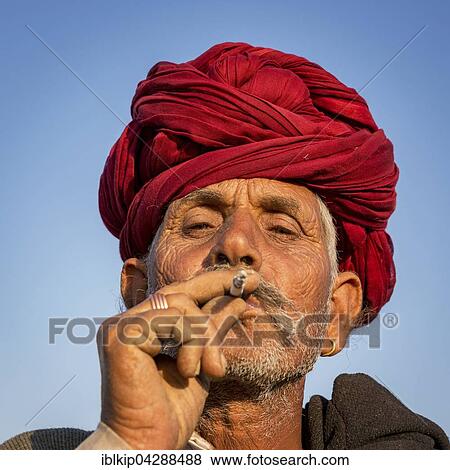 Elderly Rajasthani man with an red turban, Pushkar, Rajasthan, India, Asia View Large Photo Image Stock Photo - Elderly Rajasthani man with an red turban, Pushkar, Rajasthan, India, Asia. Fotosearch
