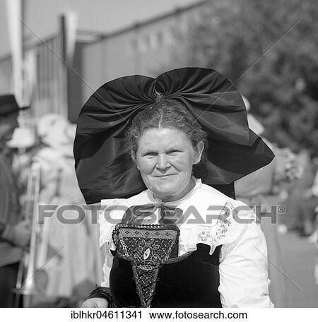Elderly woman in traditional traditional costume with hair ornaments, ca. 1955, Freiburg, Germany, Europe View Large Photo Image Stock Image - Elderly woman in traditional traditional costume with hair ornaments, ca. 1955, Freiburg, Germany, Europe. Fotosearch