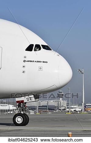 Stock Image - Emirates, Airbus, A380-800, Roll Out on Runway South, with Tower, Munich Airport, Upper Bavaria, Germany, Europe. Fotosearch