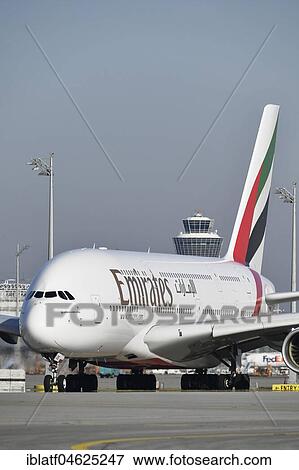Emirates, Airbus, A380-800, Roll Out on Runway South, with Tower, Munich Airport, Upper Bavaria, Germany, Europe View Large Photo Image Stock Photo - Emirates, Airbus, A380-800, Roll Out on Runway South, with Tower, Munich Airport, Upper Bavaria, Germany, Europe. Fotosearch