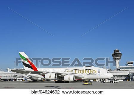 Stock Image - Emirates Airlines, Airbus A380-800, with tower, Munich Airport, Upper Bavaria, Germany, Europe. Fotosearch