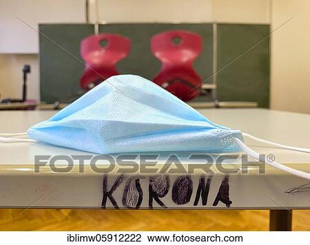 Empty classroom, seated, face mask and lettering KORONA on table, single tables without distance rule, Corona crisis, Germany, Europe View Large Photo Image Stock Image - Empty classroom, seated, face mask and lettering KORONA on table, single tables without distance rule, Corona crisis, Germany, Europe. Fotosearch