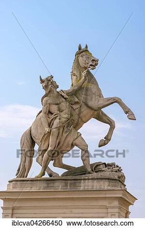 Stock Image - Equestrian statue, Obotrit, holding his horse, Castle Bridge, Schwerin Castle, Schwerin, Mecklenburg-Western Pomerania, Germany, Europe. Fotosearch