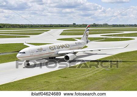 Stock Photo - Etihad Airlines, Airbus, A330, on taxiway, Munich Airport, Upper Bavaria, Germany, Europe. Fotosearch
