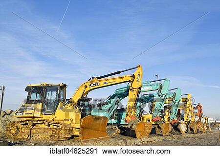 Excavator, bulldozer, construction machinery, Munich Airport, Upper Bavaria, Germany, Europe View Large Photo Image Stock Image - Excavator, bulldozer, construction machinery, Munich Airport, Upper Bavaria, Germany, Europe. Fotosearch
