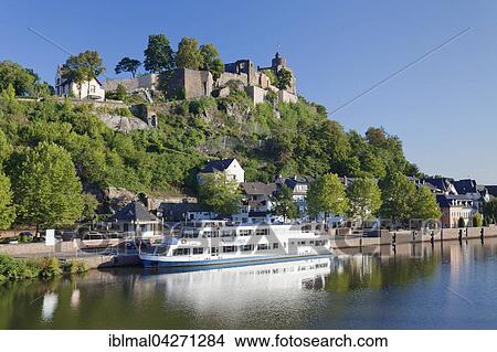 Excursion boat on the Saar, behind castle ruins, Rhineland-Palatinate, Saarland, Germany, Europe View Large Photo Image Picture - Excursion boat on the Saar, behind castle ruins, Rhineland-Palatinate, Saarland, Germany, Europe. Fotosearch