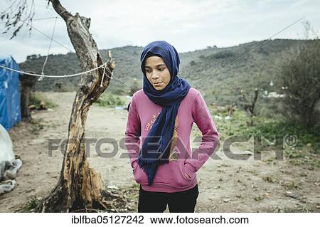 Farah, 13, from Idlib, Syria, travelling with her father, one brother is already in Germany, family was divided, her mother and her other brother were imprisoned in Turkey, Moria, Lesbos, Greece, Europe View Large Photo Image Stock Image - Farah, 13, from Idlib, Syria, travelling with her father, one brother is already in Germany, family was divided, her mother and her other brother were imprisoned in Turkey, Moria, Lesbos, Greece, Europe. Fotosearch