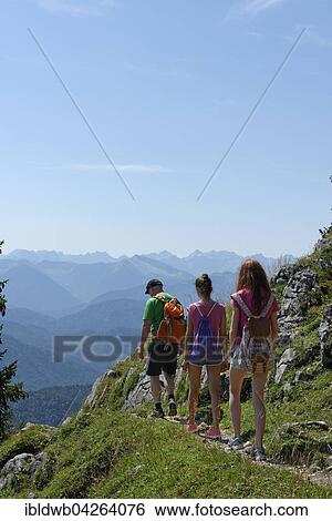 Father with two girls, teens, children mountaineering, Brauneck in Lenggries, Isarwinkel, Upper Bavaria, Bavaria, Germany, Europe View Large Photo Image Stock Photograph - Father with two girls, teens, children mountaineering, Brauneck in Lenggries, Isarwinkel, Upper Bavaria, Bavaria, Germany, Europe. Fotosearch