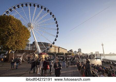 Ferris wheel in the historic centre, Burgplatz square, Schlossturm, Dusseldorf, North Rhine-Westphalia View Large Photo Image Stock Image - Ferris wheel in the historic centre, Burgplatz square, Schlossturm, Dusseldorf, North Rhine-Westphalia. Fotosearch