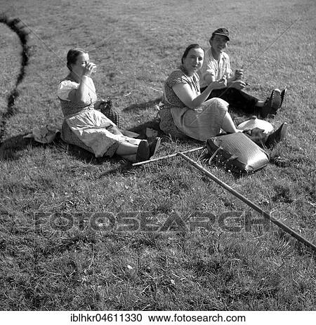 Field workers take a break, agriculture, ca. 1955, near Freiburg, Germany, Europe View Large Photo Image Stock Image - Field workers take a break, agriculture, ca. 1955, near Freiburg, Germany, Europe. Fotosearch