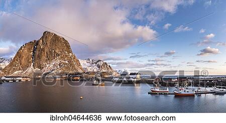 Stock Photograph - Fishing boat in the harbour at dawn, Hamnøy, Reine, Lofoten, Norway, Europe. Fotosearch