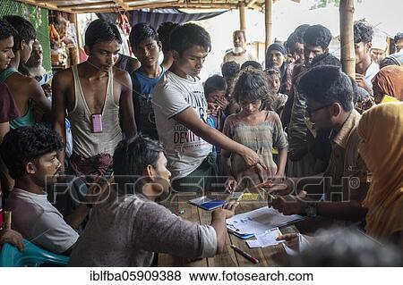 Fled Rohingya during registration in a sector of the camp Kutupalong, Cox Bazar, Bangladesh, Asia View Large Photo Image Stock Photo - Fled Rohingya during registration in a sector of the camp Kutupalong, Cox Bazar, Bangladesh, Asia. Fotosearch