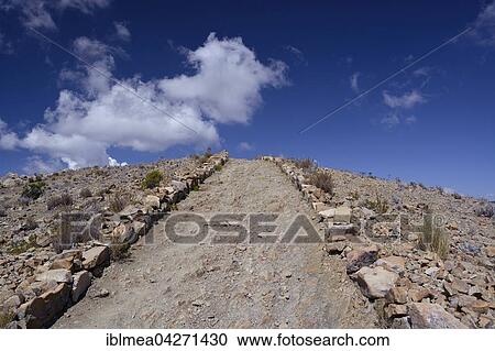 Footpath through barren stony land, Isla del Sol, Island of the Sun, Lake Titicaca, Bolivia, South America View Large Photo Image Stock Image - Footpath through barren stony land, Isla del Sol, Island of the Sun, Lake Titicaca, Bolivia, South America. Fotosearch