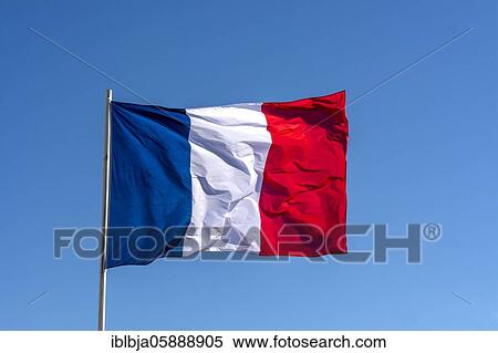 Stock Photography - French flag flying in the wind, France, Europe. Fotosearch