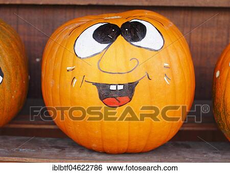 Funny face painted pumpkin (Curcurbita) View Large Photo Image Stock Photograph - Funny face painted pumpkin (Curcurbita). Fotosearch
