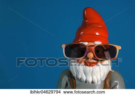 Picture - Garden gnome with sunglasses, Germany, Europe. Fotosearch