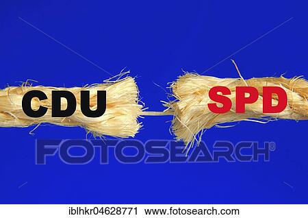 German political parties CDU and SPD lettering on almost torn rope View Large Photo Image Stock Image - German political parties CDU and SPD lettering on almost torn rope. Fotosearch