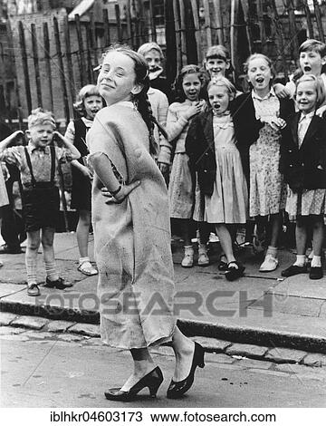 Girl dancing with sackcloth as dress, England, Great Britain View Large Photo Image Stock Image - Girl dancing with sackcloth as dress, England, Great Britain. Fotosearch