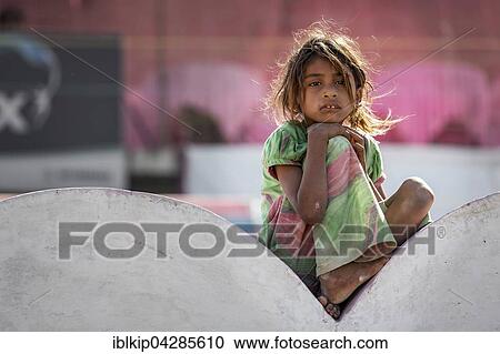 Girl sitting on a wall, portrait, Pushkar, Rajasthan, India, Asia View Large Photo Image Stock Image - Girl sitting on a wall, portrait, Pushkar, Rajasthan, India, Asia. Fotosearch