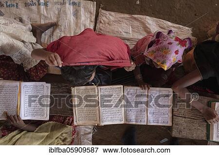 Girls reading in a madrasah, Koran school, camp for Rohingya refugees from Myanmar, Kutupalong, Cox Bazar, Bangladesh, Asia View Large Photo Image Stock Photo - Girls reading in a madrasah, Koran school, camp for Rohingya refugees from Myanmar, Kutupalong, Cox Bazar, Bangladesh, Asia. Fotosearch