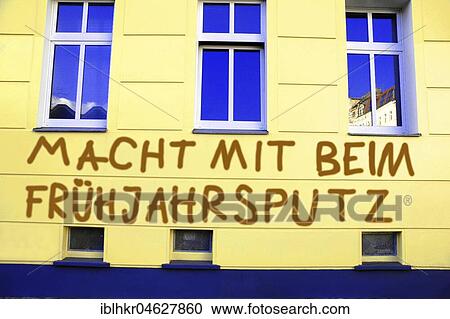 Stock Image - Graffiti, Power with spring cleaning, smeared house wall, Germany, Europe. Fotosearch