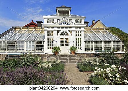 Picture - Greenhouse with flower beds in the castle garden of Gripsholm, Mariefred, Strangnas, Sodermanland County, Sweden, Europe. Fotosearch
