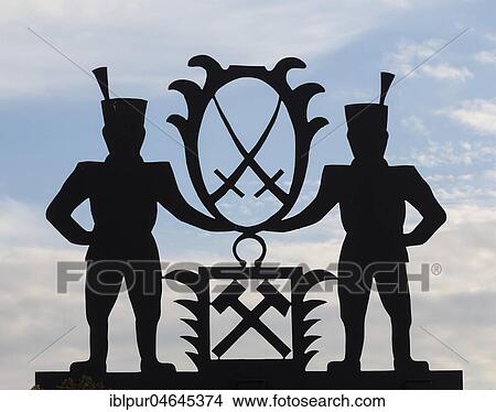 Guild symbol of miners with hammer and sword, Silhouette, Lauta, Marienberg, Ore Mountains, Saxony, Germany, Europe View Large Photo Image Picture - Guild symbol of miners with hammer and sword, Silhouette, Lauta, Marienberg, Ore Mountains, Saxony, Germany, Europe. Fotosearch