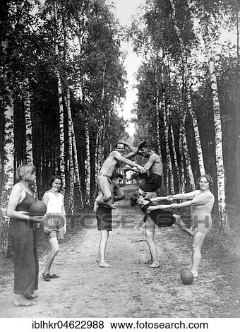 Stock Photo - Gymnastics in the forest, ca. 1920, exact place unknown, Germany, Europe. Fotosearch