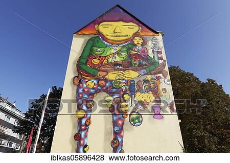 Happy giant in a play suit, surreal figure, mural of the Brazilian streetart artist duo Os Gemeos, Düsseldorf, North Rhine-Westphalia, Germany, Europe View Large Photo Image Stock Photo - Happy giant in a play suit, surreal figure, mural of the Brazilian streetart artist duo Os Gemeos, Düsseldorf, North Rhine-Westphalia, Germany, Europe. Fotosearch
