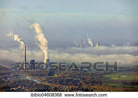 Stock Photo - Hard coal-fired power plant, STEAG and RWE Power, jointly owned power plant Bergkamen A oHG, electricity, district heating, exhaust gases, emissions, smoke, smoke, smoke, Bergkamen power station, Ruhr Area, North Rhine-Westphalia, Germany, Europe. Fotosearch